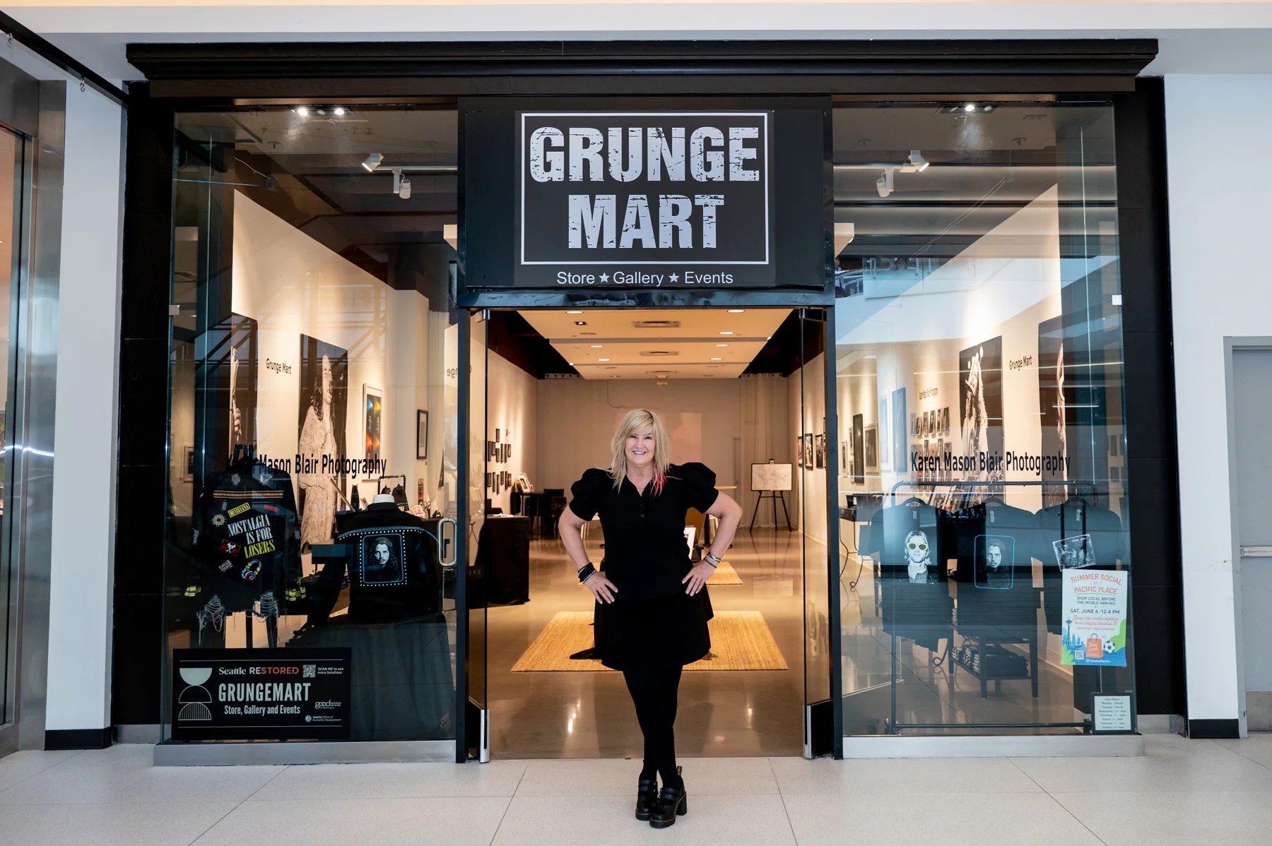 Karen Mason Blair standing in the entrance of the Grunge Mart store at Pacific Place in downtown Seattle